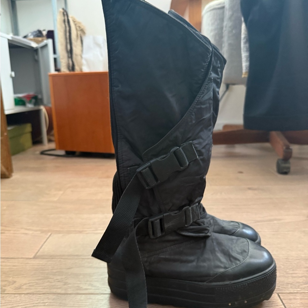 Black Ankle Boots with Decorative Straps and Rugged Sole